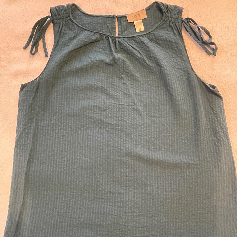 Blue, sleeveless drawstring shell top